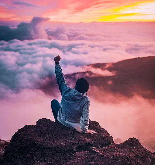 Man on the top of a mountain with freehand